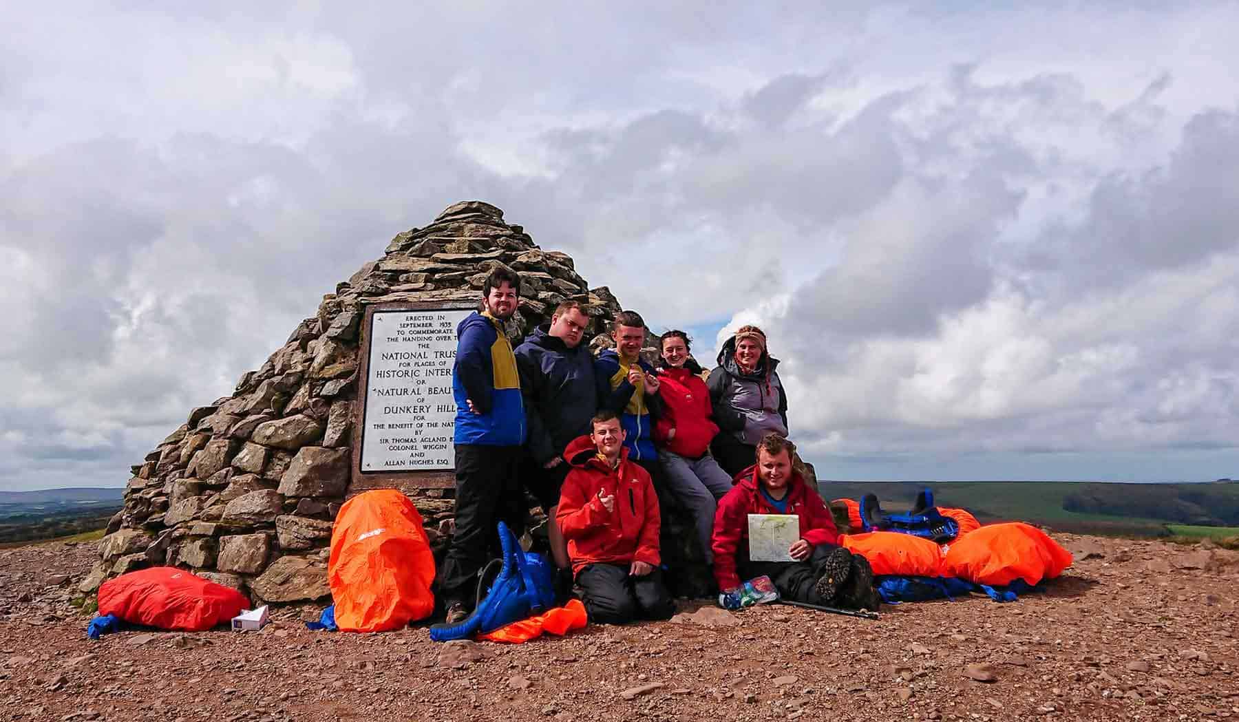 Students from progression pathways courses out hiking with specialist equipment.
